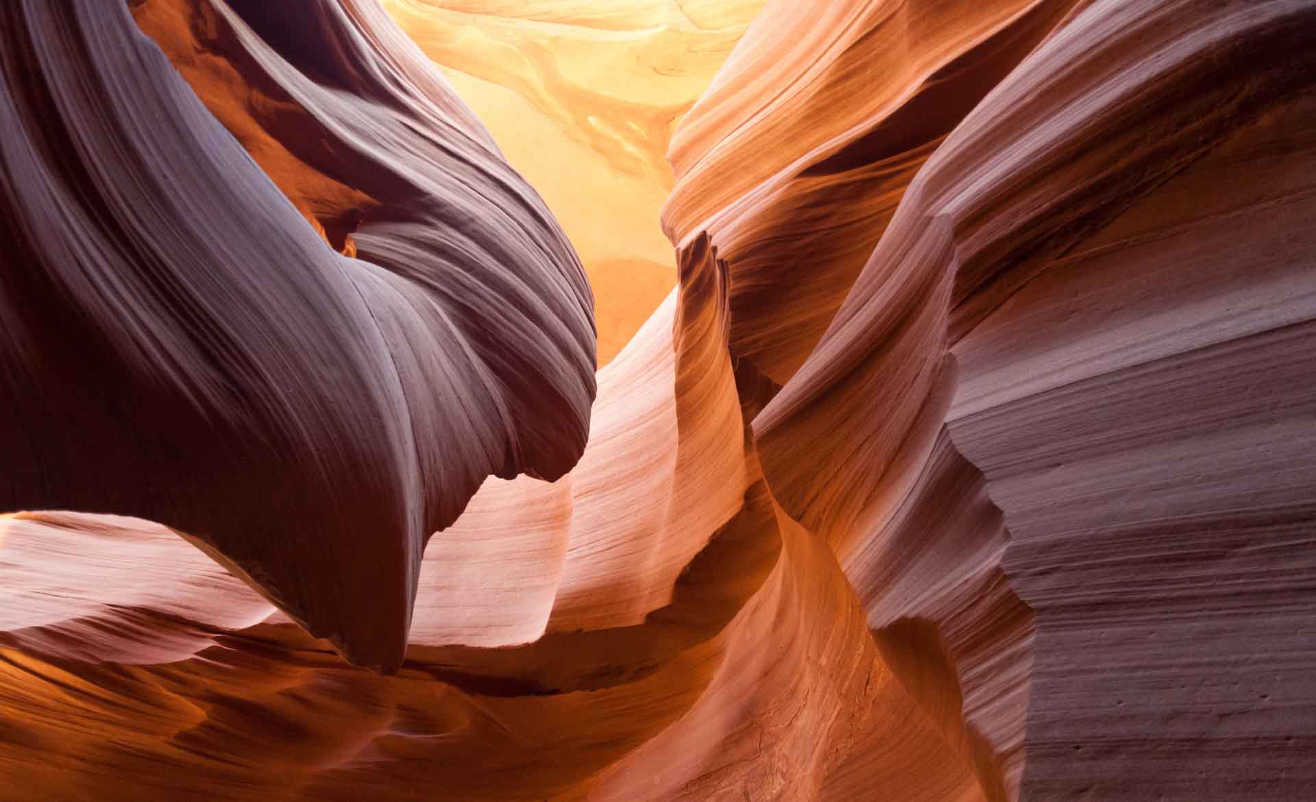 Antelope Canyon - Formed by millions of years of wind and water erosion. It has a magnificent smooth and flowing shaped sandstone.